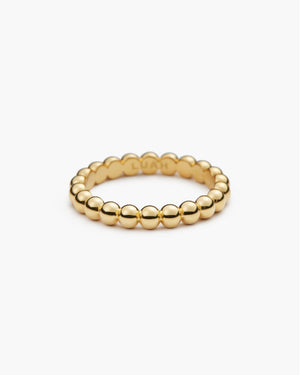 Gold beaded ring engraved "LUAH" on the inside, shown on a plain white background.