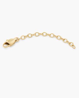 Gold textured cable chain closeup on a white background