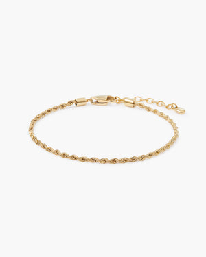 Gold rope chain bracelet with a lobster clasp and adjustable extender chain, laid flat on a white background.