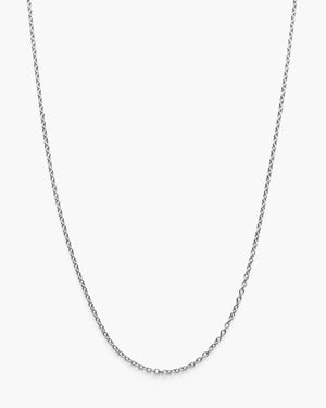 Silver cable chain necklace on a white background