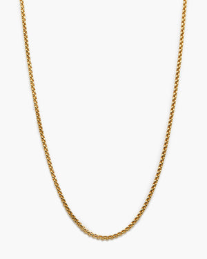 Gold rounded box chain necklace on a white background