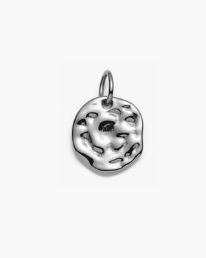 Silver round textured pendant with an organic, rippled surface, photographed on a plain white background.