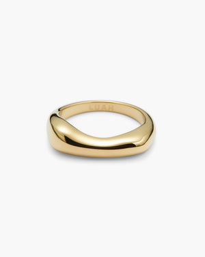 Gold wave band ring with LUAH engraving on white background