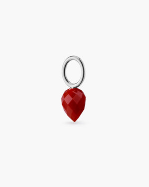 Silver hoop with red gemstone drop charm on a white background