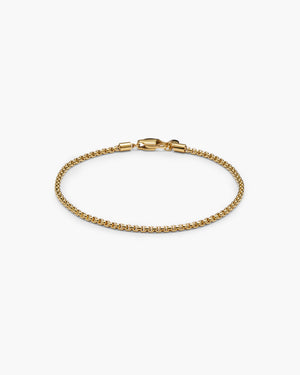Gold box chain bracelet with a lobster clasp, laid flat on a white background.
