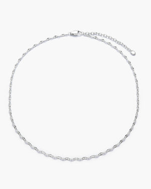 Silver twisted chain necklace on white background