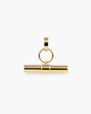 Gold bar pendant with a ring detail, photographed on a plain white background.