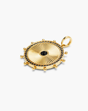 Gold circular medallion charm with a black gemstone center, edged in black gemstones and gold beading